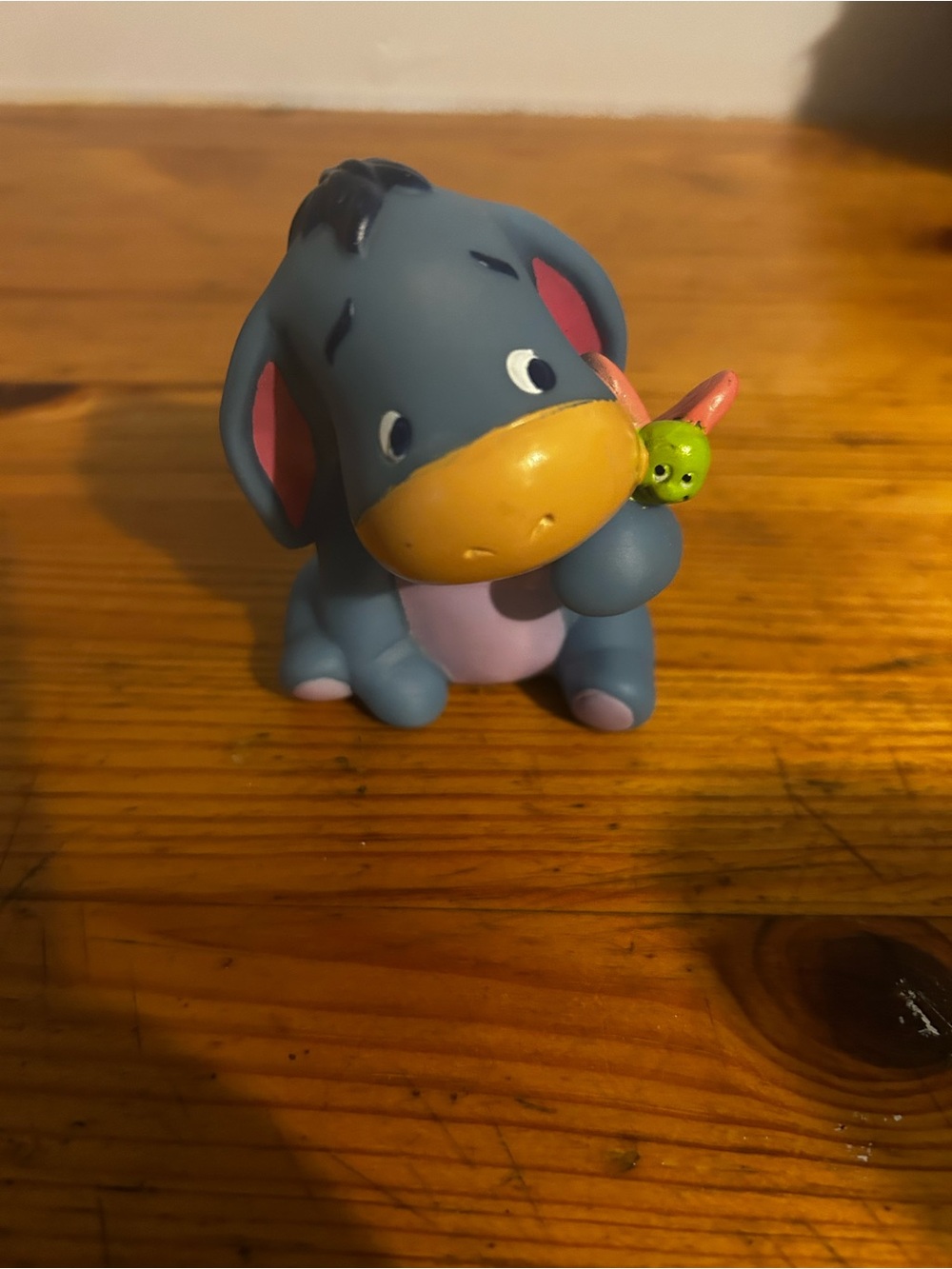 Blue Eeyore-Inspired Figure Toy with Yellow Muzzle